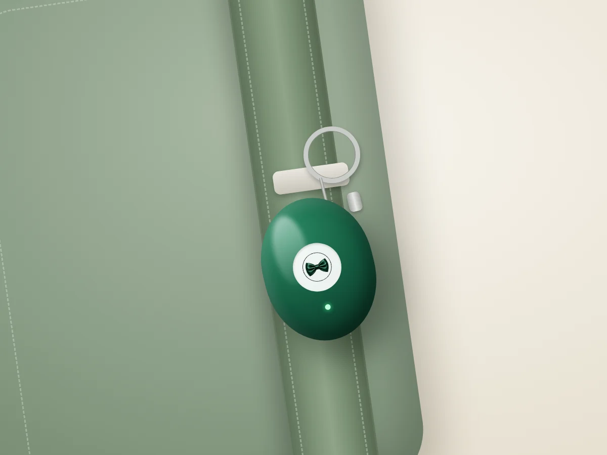 BOND Safe Alarm clipped to a backpack strap, design rendering